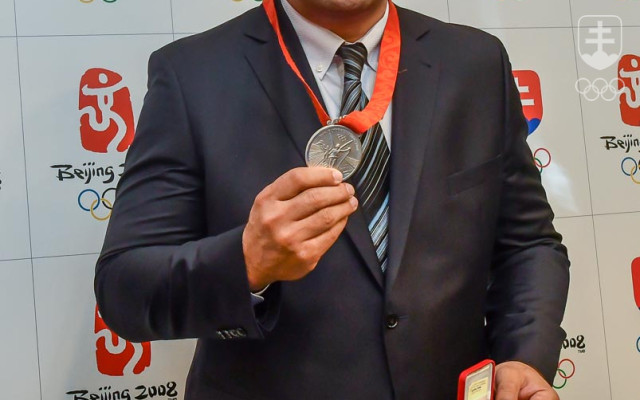 David Musuľbes s "čerstvým" olympijským striebrom namiesto pôvodného bronzu.